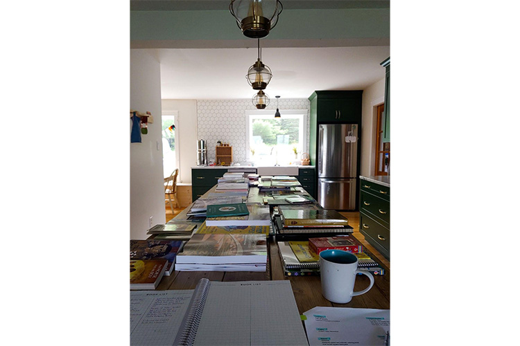 lesson planning at dining room table