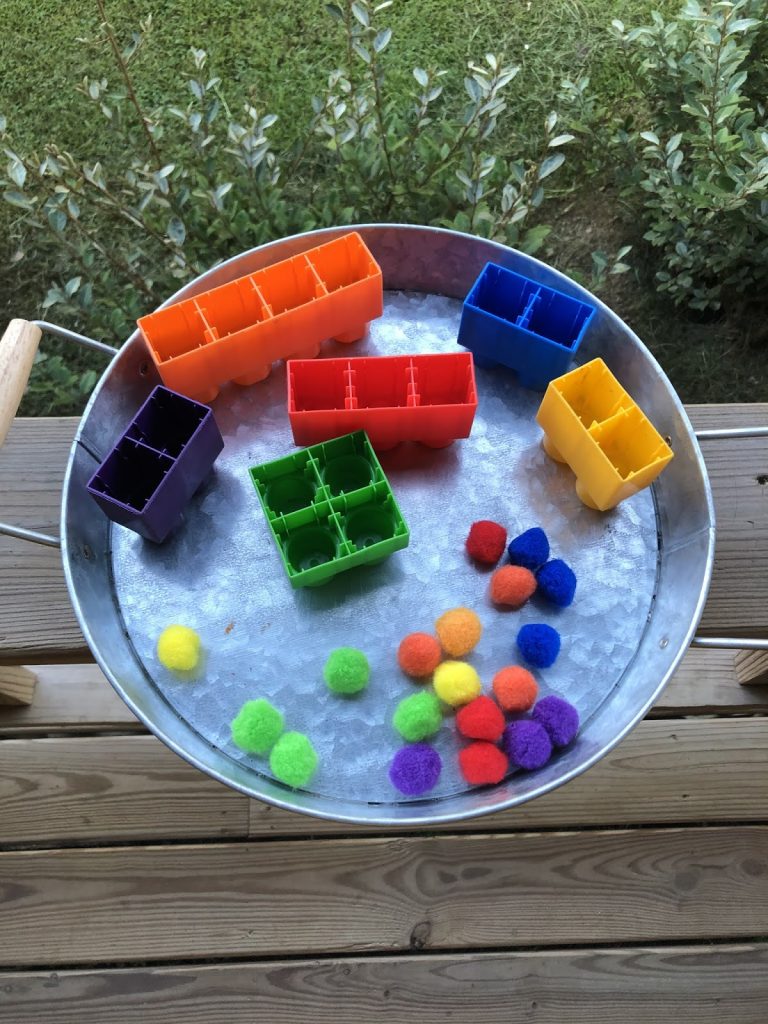 how to teach toddlers using a color match and fine motor skills development tray